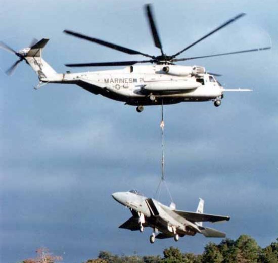 CH-53E Super Stallion lifting an F-15 Eagle fighter